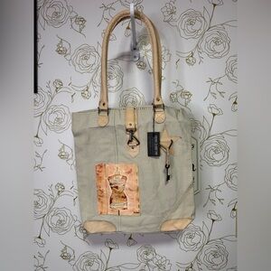 Elegant Beige Tote Bag with Artistic Patch
